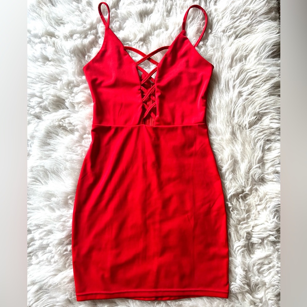 Sexy night out dress! Beautiful low necked red dress. Slim wear